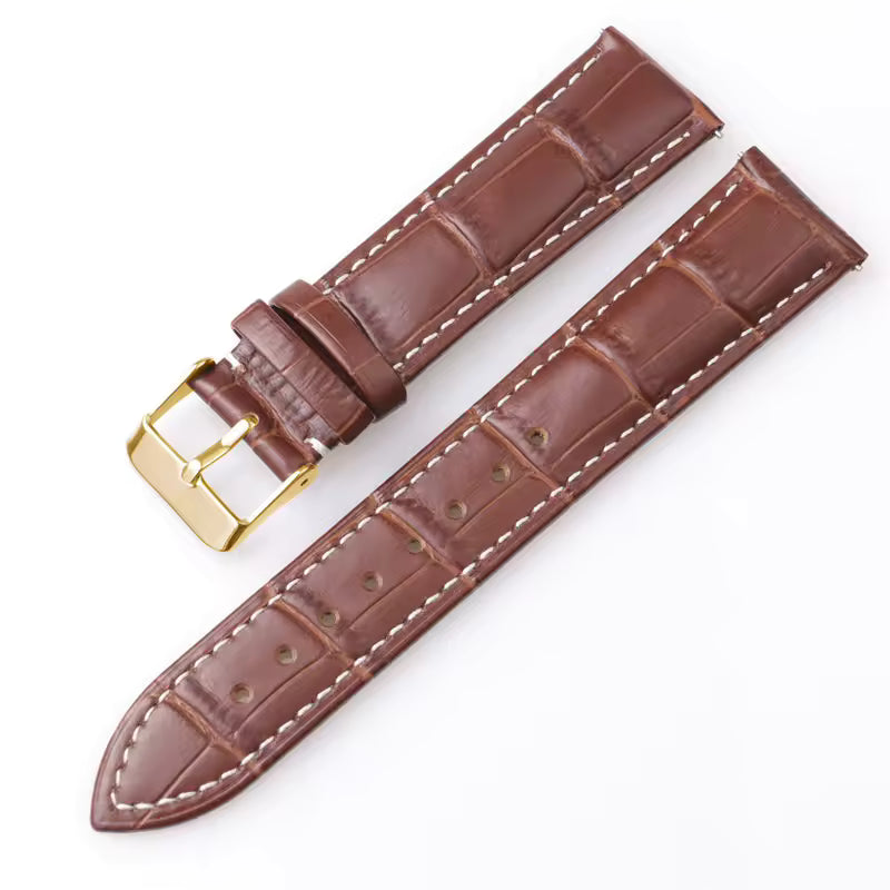 Dark brown leather watch strap with white stitching, croc print and gold buckle